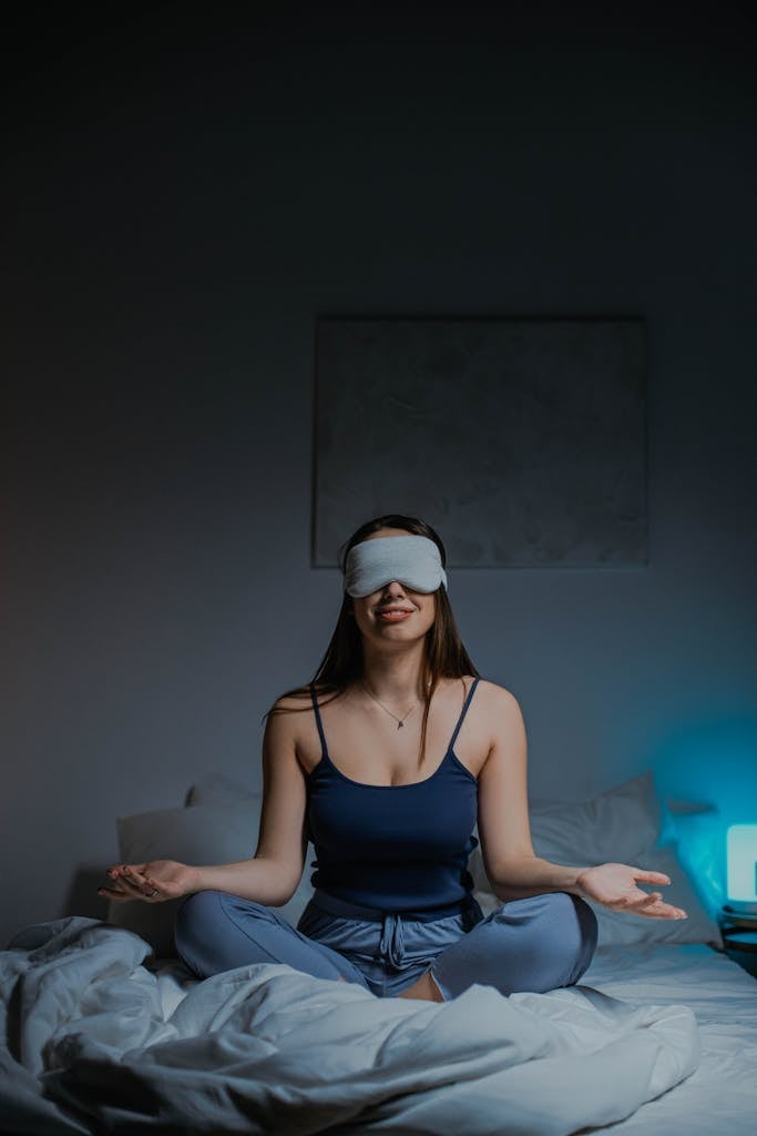 A Woman Meditating on the Bed